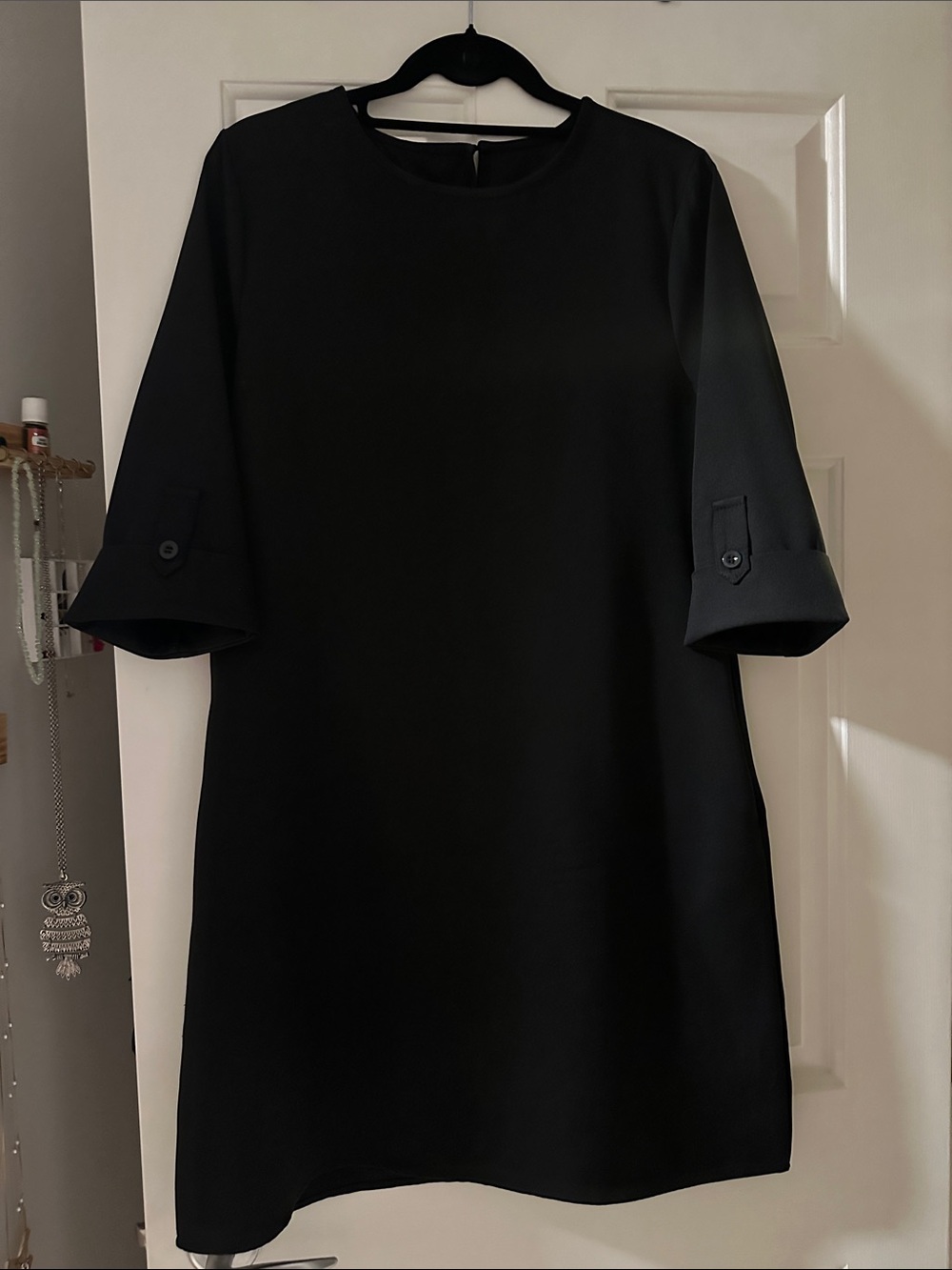 Classic Black Shift Dress with Tab Sleeve Detail